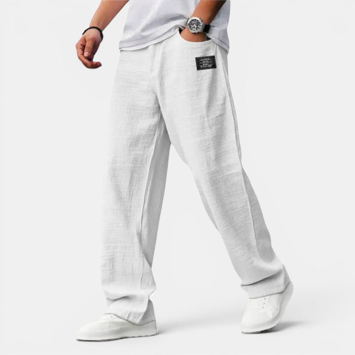 Versatile men's drawstring wide leg pants, great for summer, beach, or comfortable everyday style.