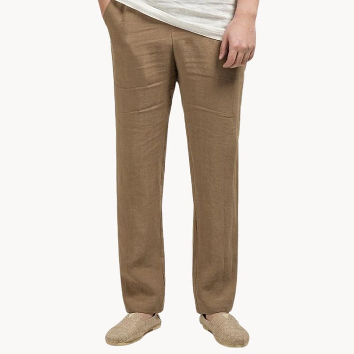 Comfortable men's straight leg linen pants with elastic waist. Breathable fabric for summer & holiday wear.
