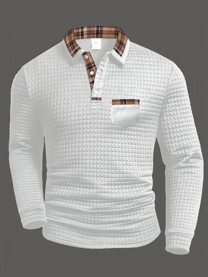 Upgrade your wardrobe with this versatile men's checked long sleeve polo.