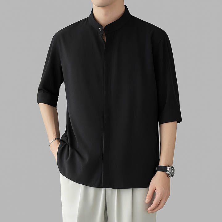 Casual men's long-sleeve mandarin collar shirt with button front, ideal for comfortable and stylish fashion.