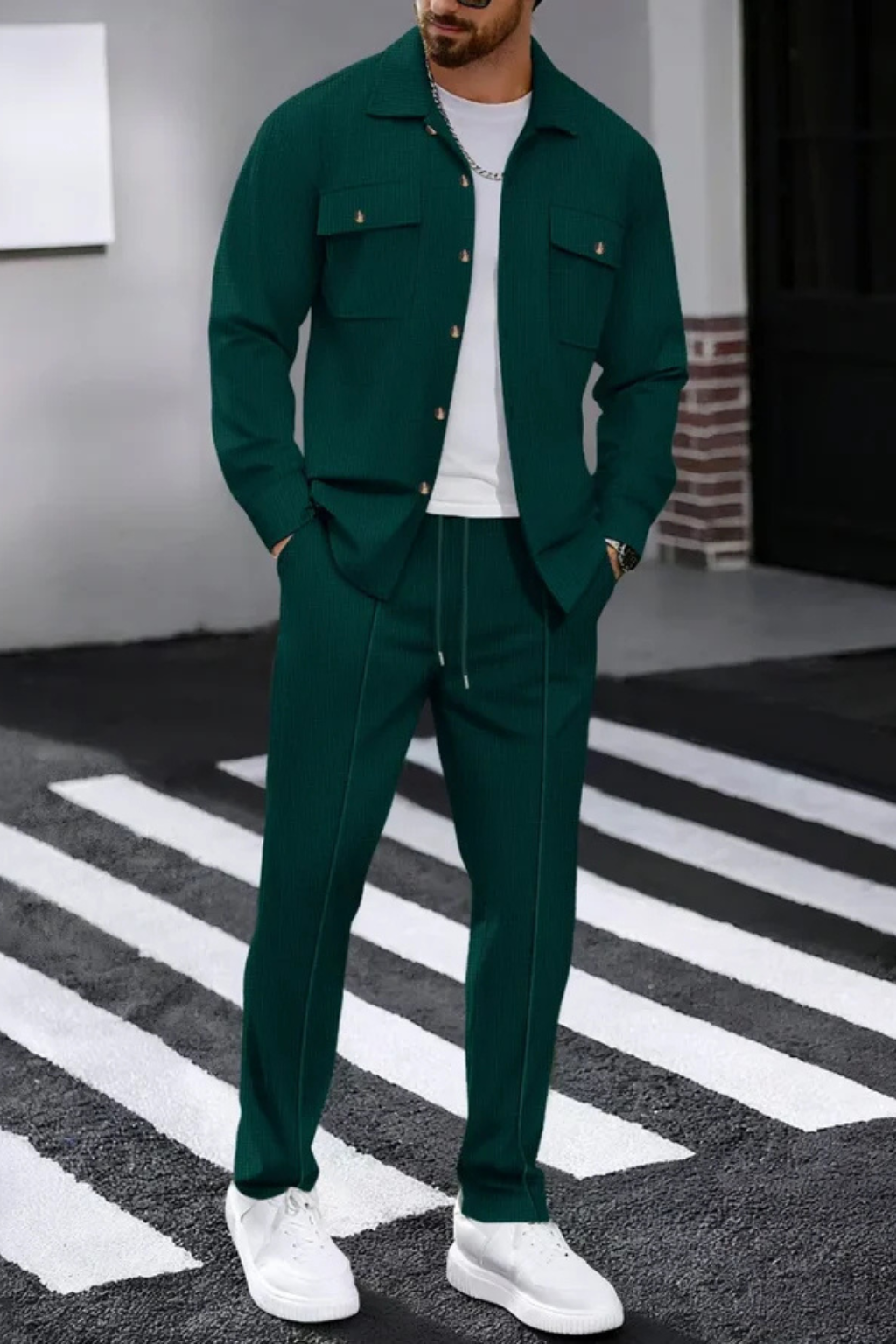 Men's coordinated outfit for smart casual occasions: overshirt and trousers.