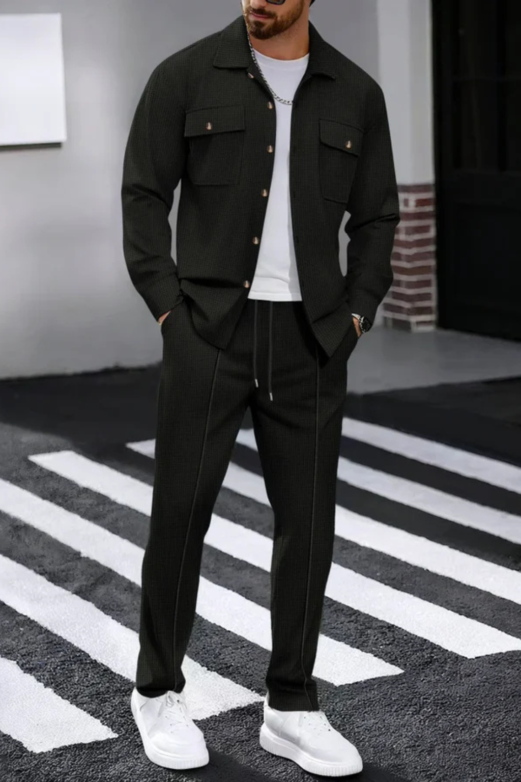 Casual men's two-piece outfit: button-up overshirt with chest pocket and trousers.