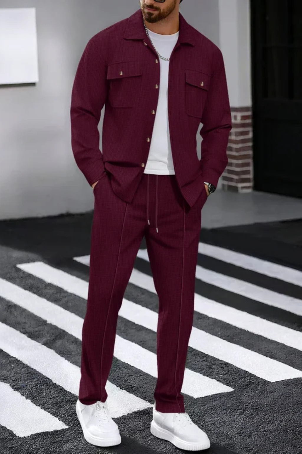 Full view of the men's coordinated set: overshirt and straight leg trousers.