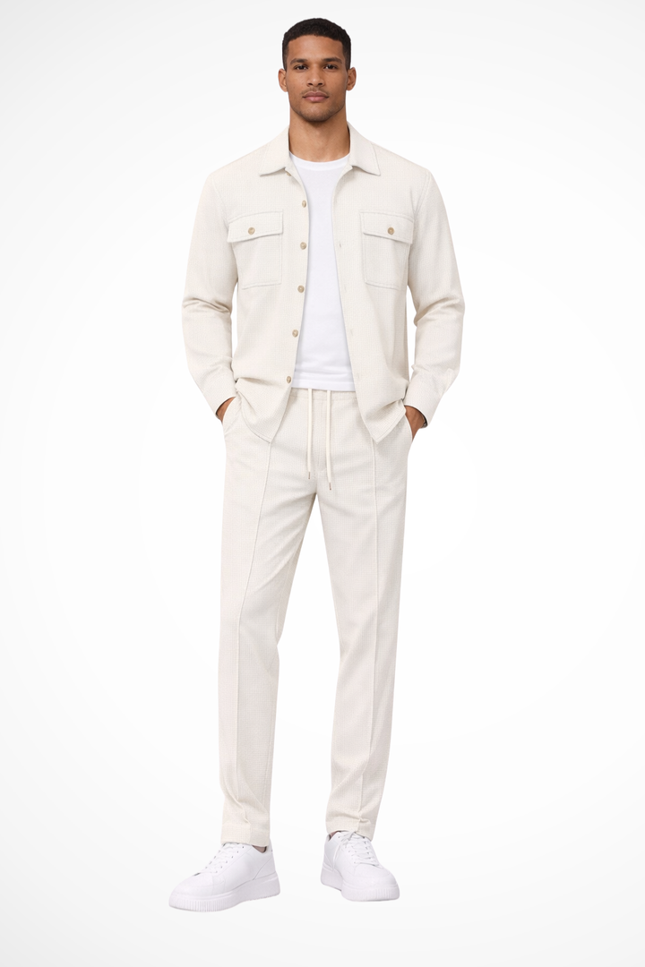 Men's casual wear two-piece set with a relaxed fit overshirt and trousers.
