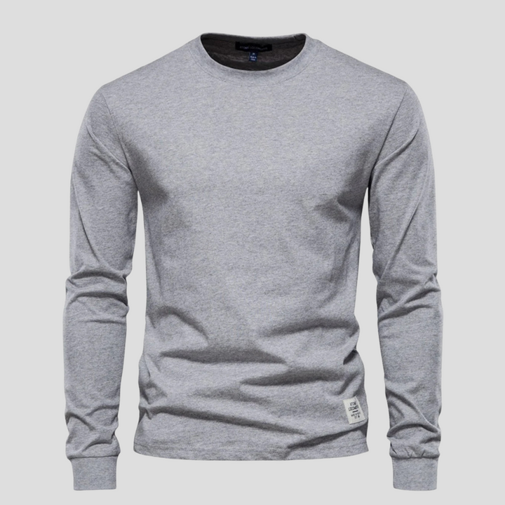 Men's long-sleeve round-neck top, a comfortable basic for any casual occasion or layering ensemble.
