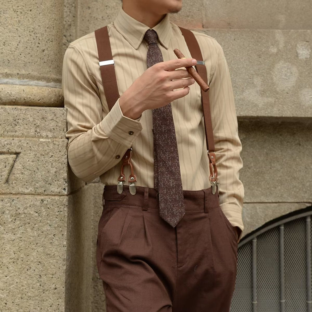 Classic men's striped button-up shirt with point collar, ideal for formal wear or sophisticated office attire.