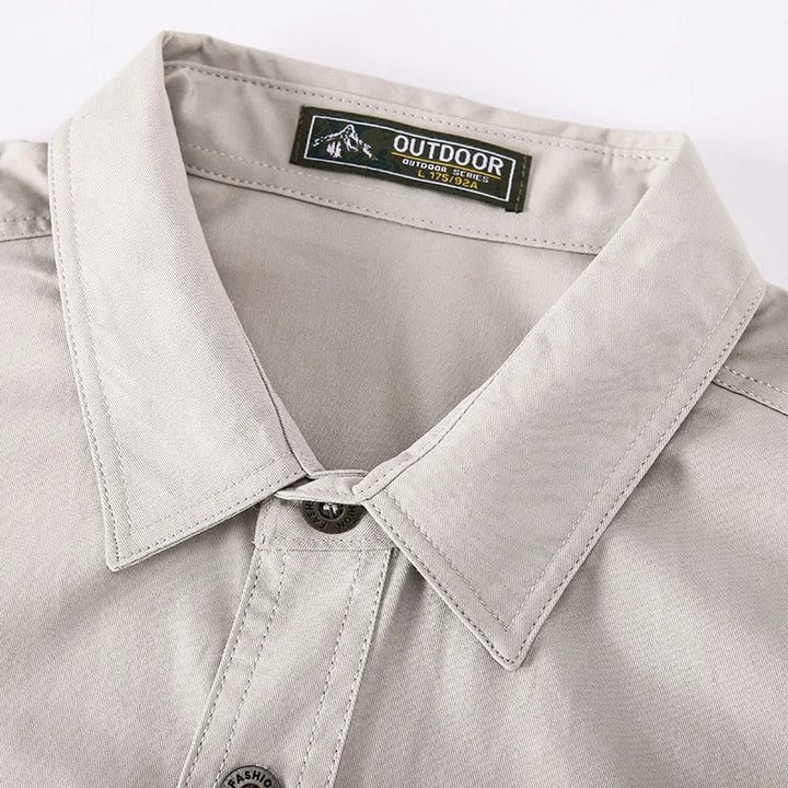 Stylish men's cargo shirt, long sleeve, comfort fit, perfect for outdoor & workwear.