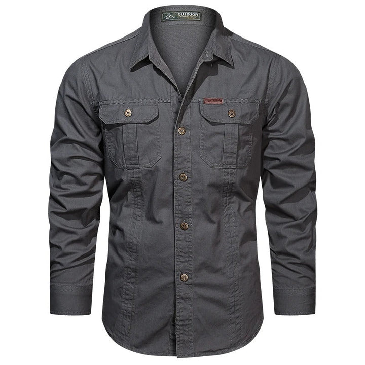 Workwear-inspired men's utility shirt, comfort fit, multiple pockets for practical daily use.