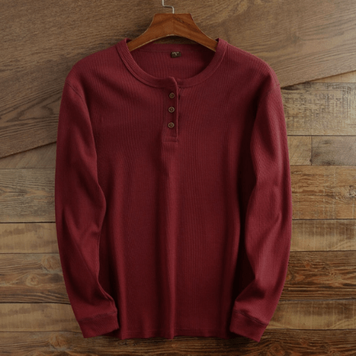 Versatile men's long sleeve henley shirt, ideal for layering or wearing on its own.