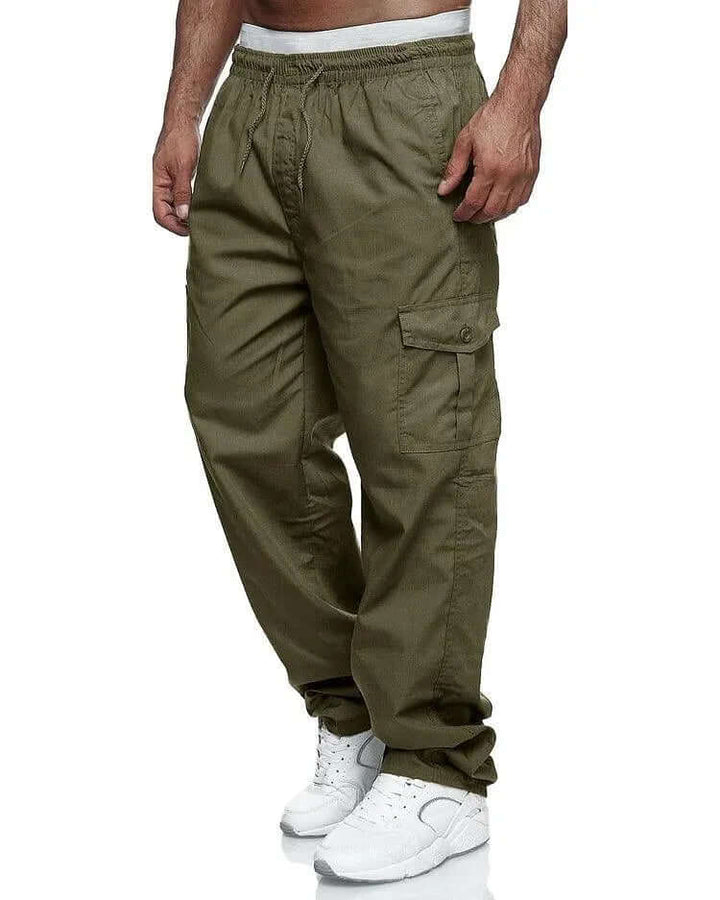 Men's loose fit cargo trousers with elastic waist for comfort & everyday wear. Practical utility pants.