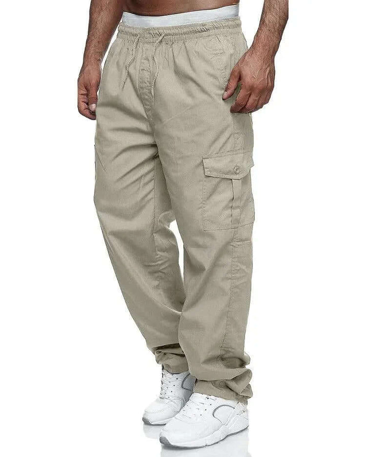 Practical men's loose fit cargo utility pants, elastic waist, versatile for outdoor & casual fashion.