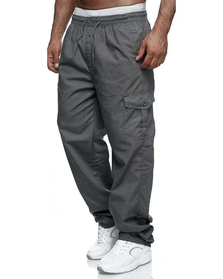 Men's utility cargo pants, loose fit with elastic waist for maximum comfort & freedom of movement. Casual & practical.