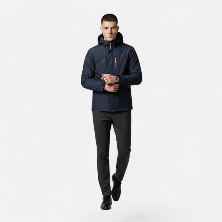 Side profile of a men's loose-fit jacket with a functional hood for warmth.