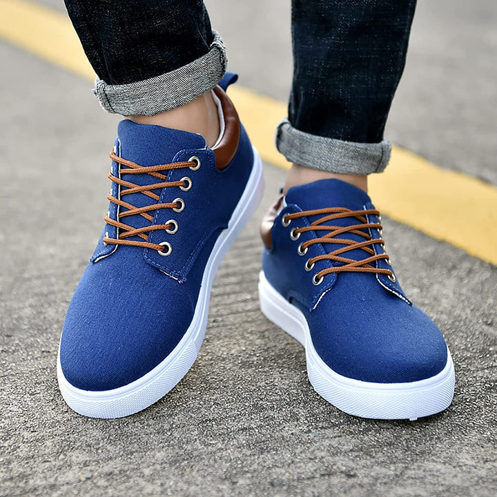 A pair of men's low-top casual lace-up sneakers with platform sole, ready for ultimate everyday comfort.