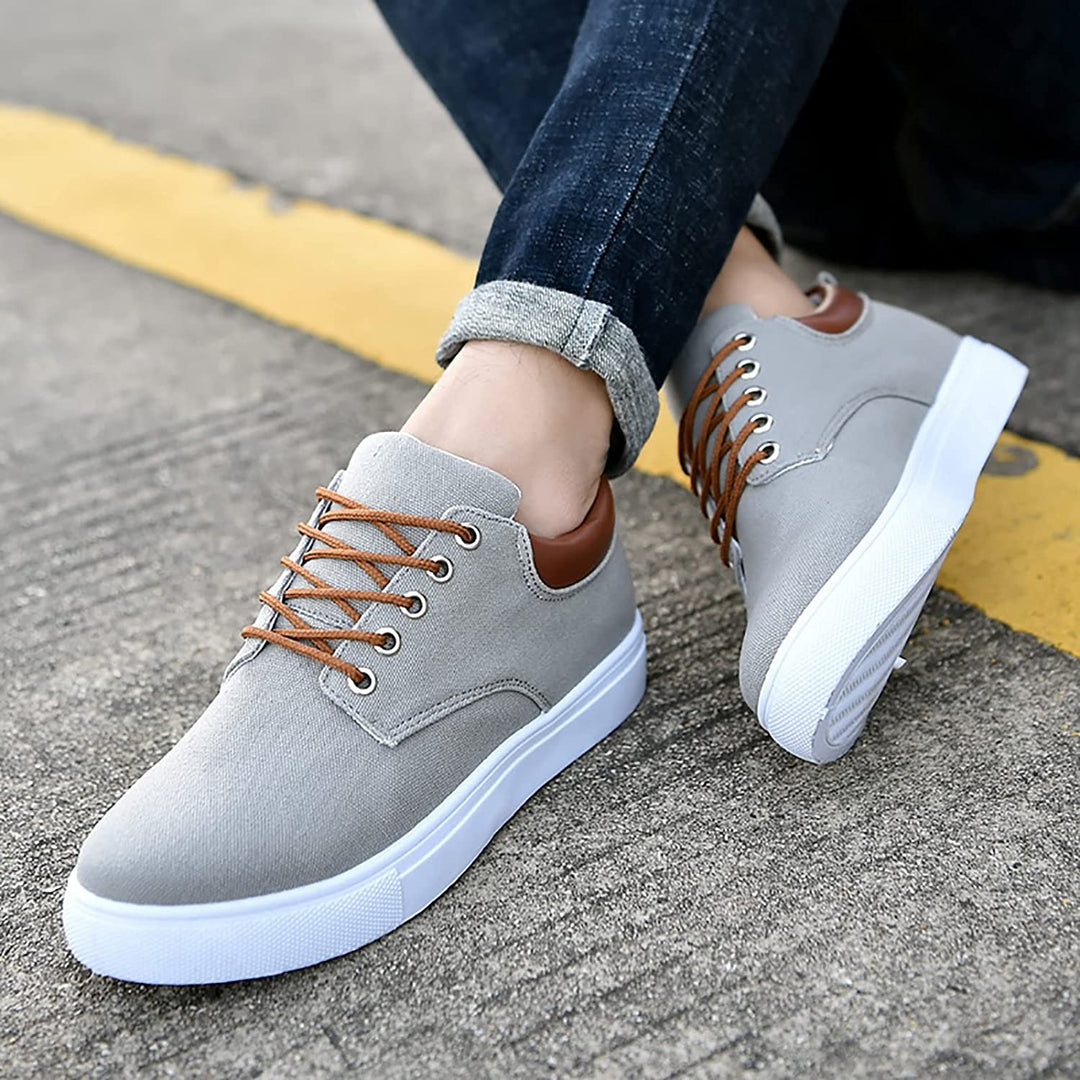 Dynamic shot of men's casual lace-up sneakers, showcasing flexibility and plush comfort features.