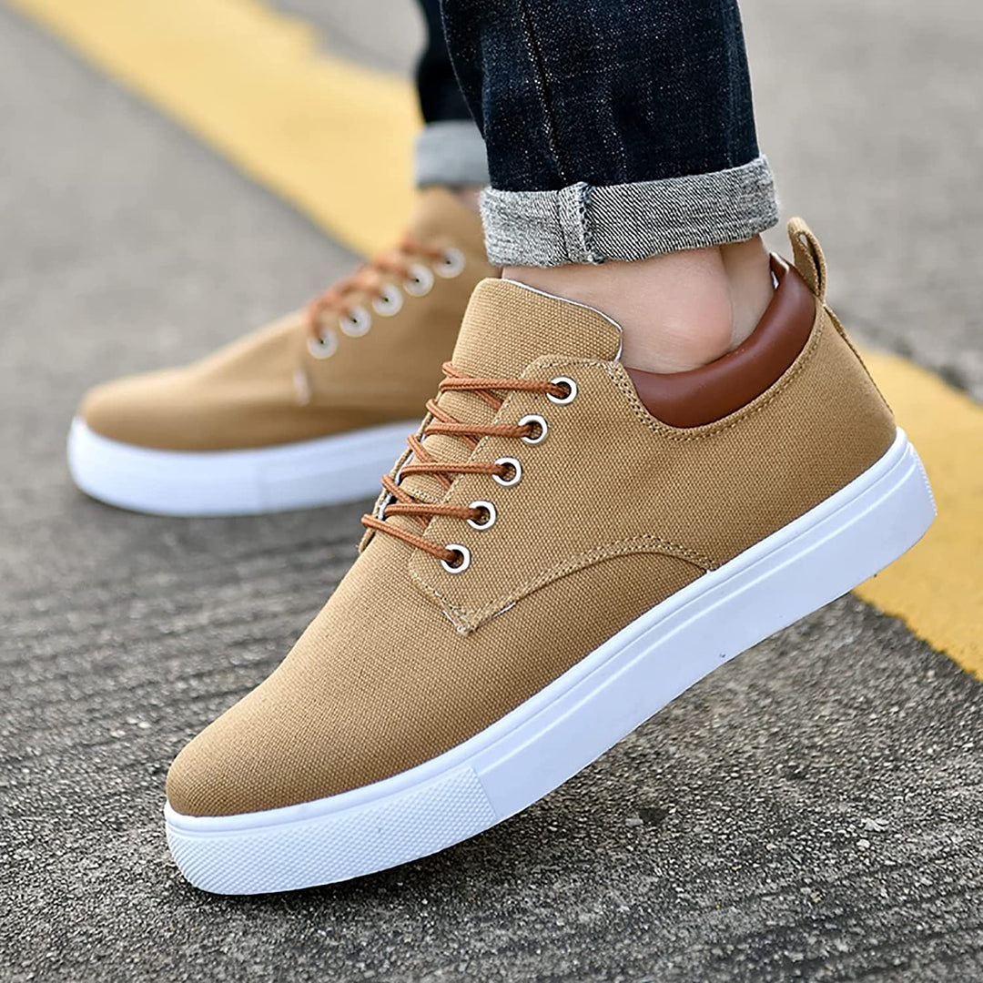 Man wearing comfortable low-top casual lace-up sneakers in a relaxed urban setting.