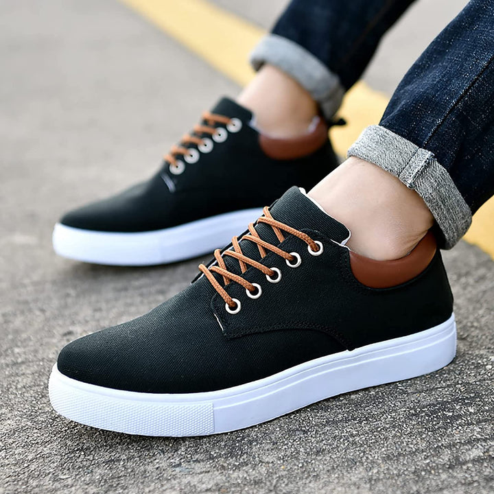 Side view of men's casual low-top lace-up sneakers, highlighting the comfortable platform sole and sleek design.