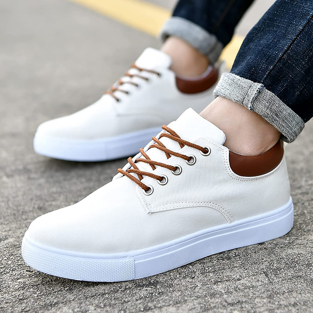 Close-up of laces on men's low-top casual sneakers, showing durable lace-up design for a secure fit.