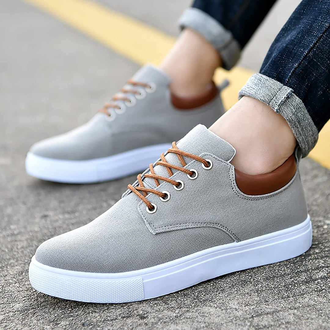 Man wearing versatile low-top lace-up casual sneakers, perfect for everyday comfort and style.