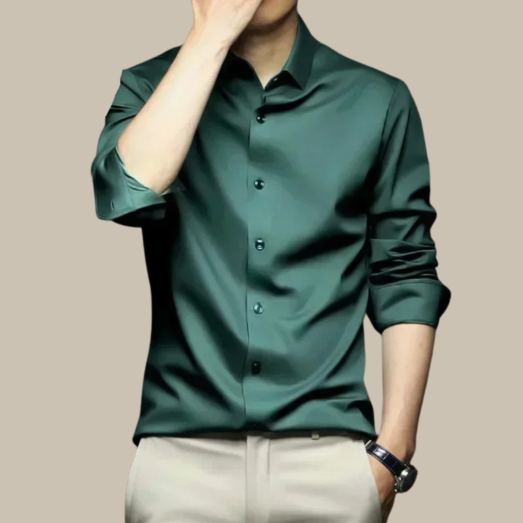 Sleeve detail of a men's elegant silk shirt, emphasizing craftsmanship in casual luxury apparel.