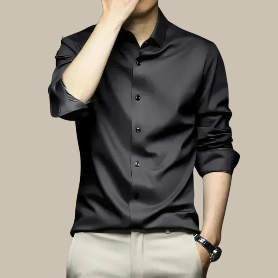 A man styled in a luxurious silk casual shirt, embodying effortless elegance and modern mens fashion.
