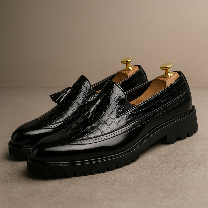 Stylish men's croc-embossed luxury tassel loafers. Fashionable slip-on dress shoes for formal wear.