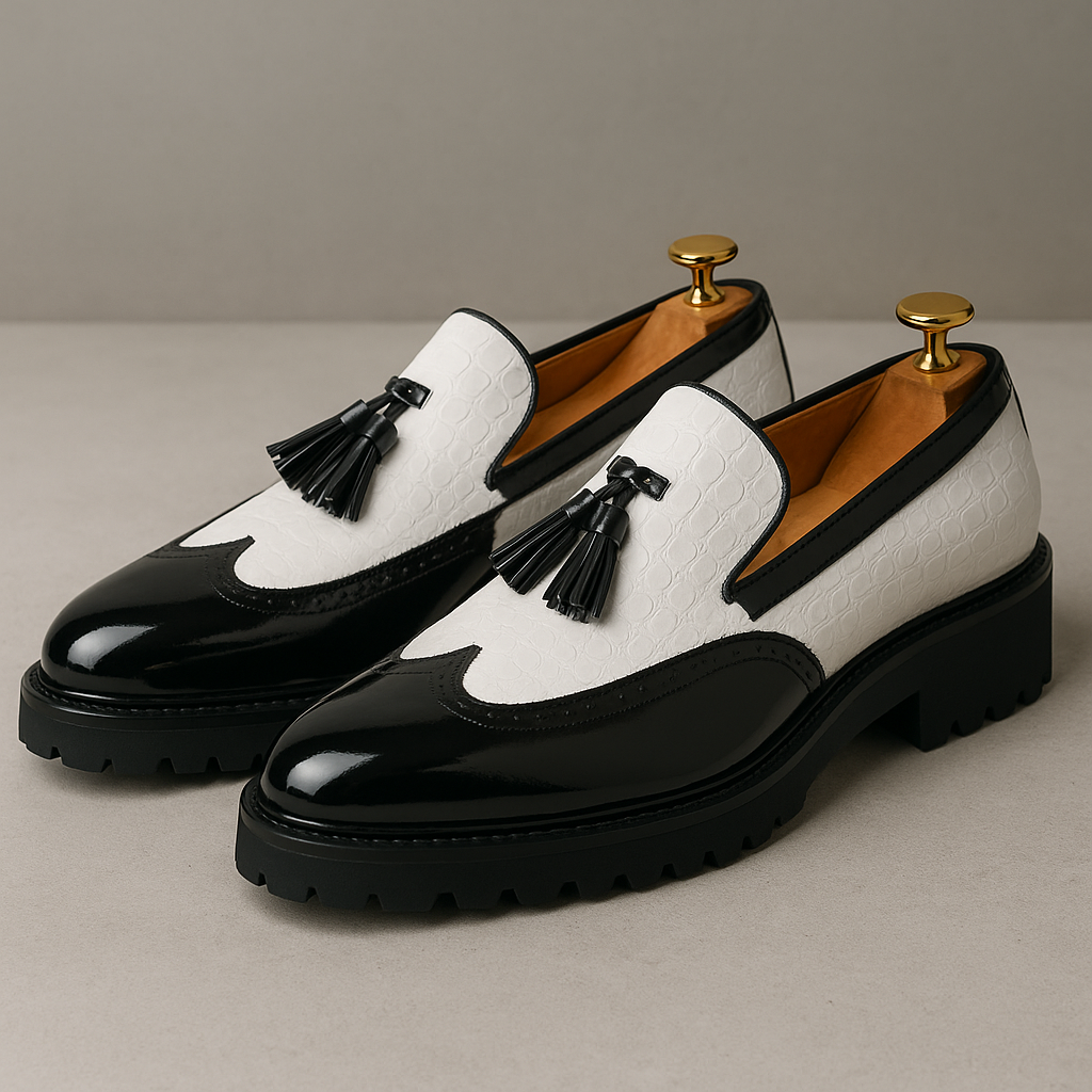Luxury men's croc-embossed tassel loafers. Elegant slip-on formal dress shoes for sophisticated style.