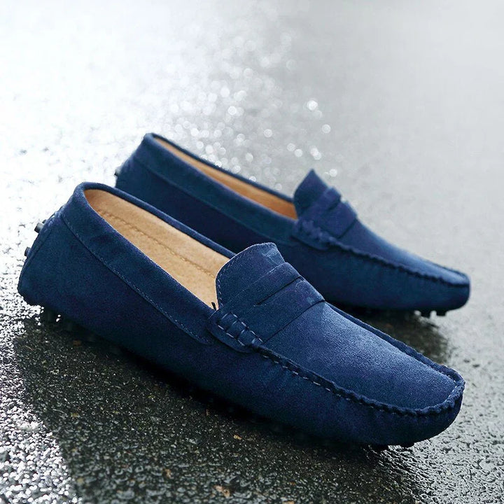 Top-down view of men's comfortable footwear. These luxury driving loafers combine style, quality, & daily ease.