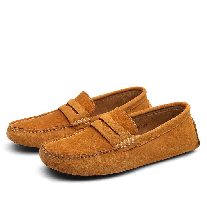 Close-up of slip-on driving shoes; sophisticated men's footwear designed for ultimate comfort & everyday wear.