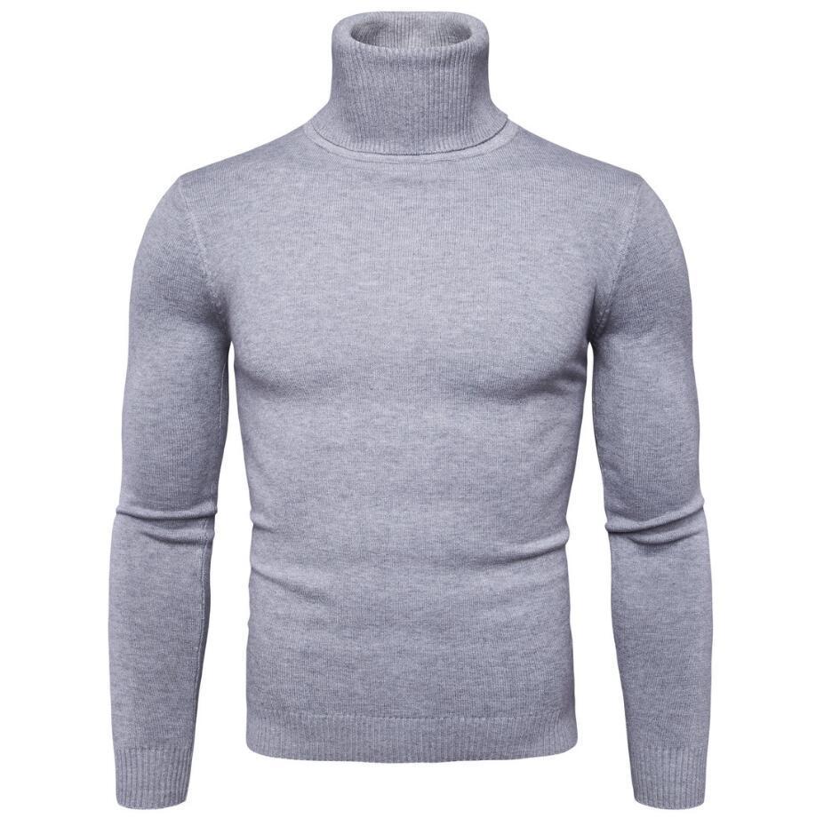 Model showcasing the comfortable fit of a men's light grey turtleneck sweater