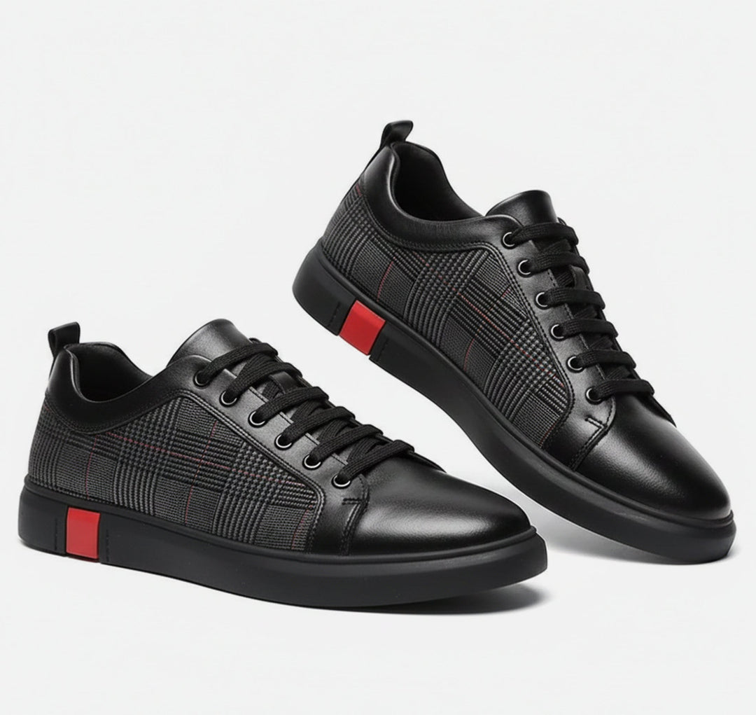 Stylish men's black street sneakers, low top. Effortless minimalist design for men's fashion and daily footwear.