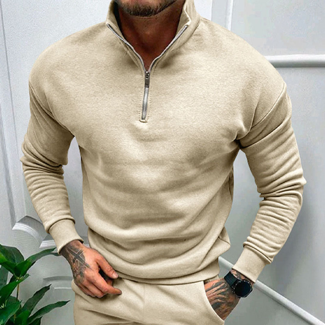 Stylish man in a smart casual men's half zip pullover jumper, a versatile long sleeve top for modern menswear.