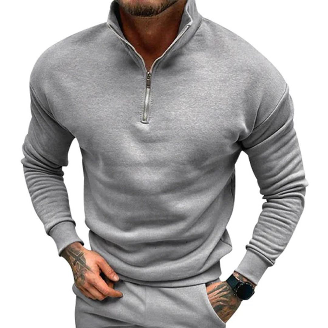 Textured men's half zip pullover jumper, a soft long sleeve top with minimalist design for versatile layering.