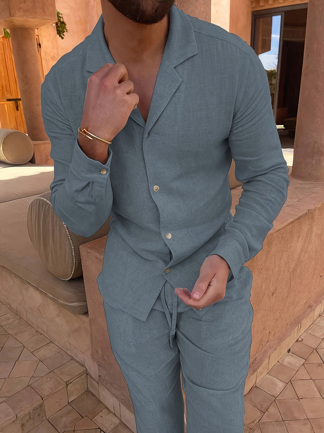 Close-up of breathable linen blend fabric in a men's minimalist two-piece set, perfect for summer comfort.