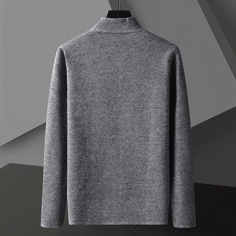 Stylish men's textured knit cardigan, button-front design, great for layering in cooler weather.