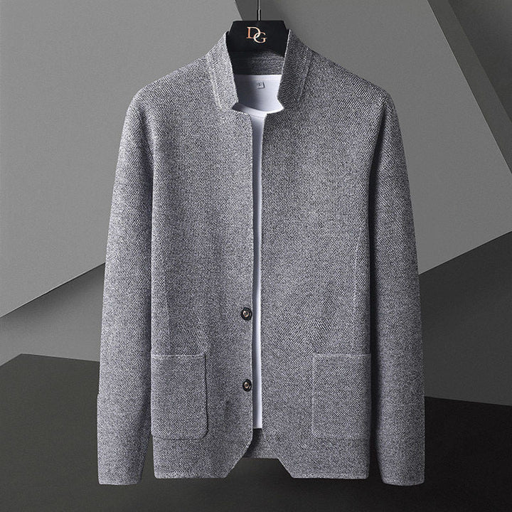 Minimalist men's textured button-front cardigan. Essential layering piece for modern style.