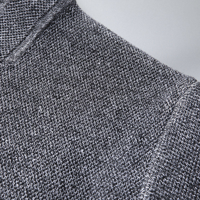 Smart casual men's cardigan featuring a subtle textured knit and practical button front.