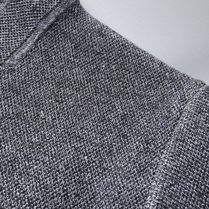 Smart casual men's cardigan featuring a subtle textured knit and practical button front.