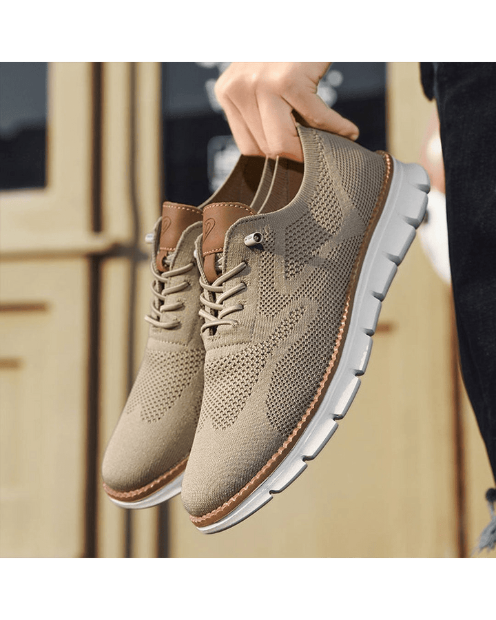 Lightweight men's everyday sneakers, combining breathable comfort with a sleek athletic style.
