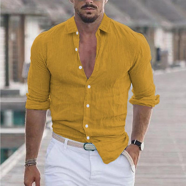 Versatile men's long-sleeve button-up shirt, modern fit, suitable for casual to formal occasions.