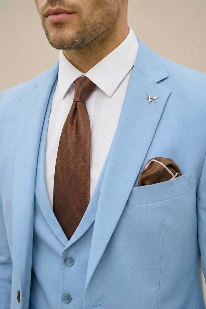 Stylish man in a modern fit, three piece suit, showcasing the spring collection.