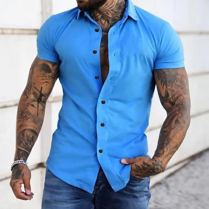 A man in a stylish, modern cut short sleeve shirt, ideal for smart casual events.
