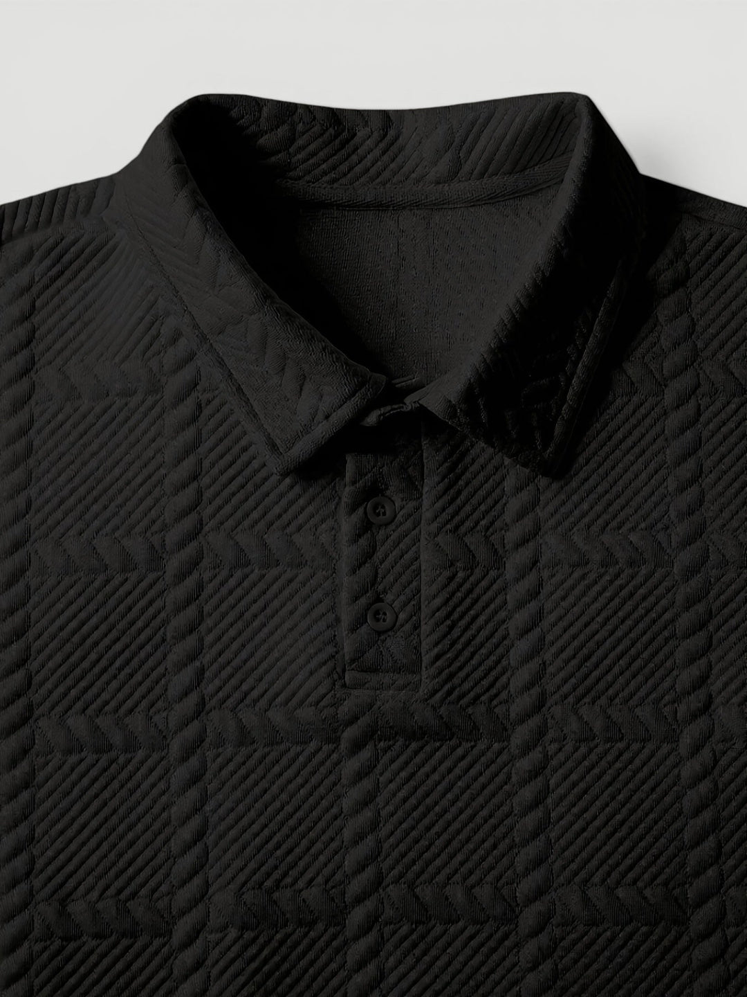 Modern men's button polo shirt with unique jacquard knit texture for a refined look.
