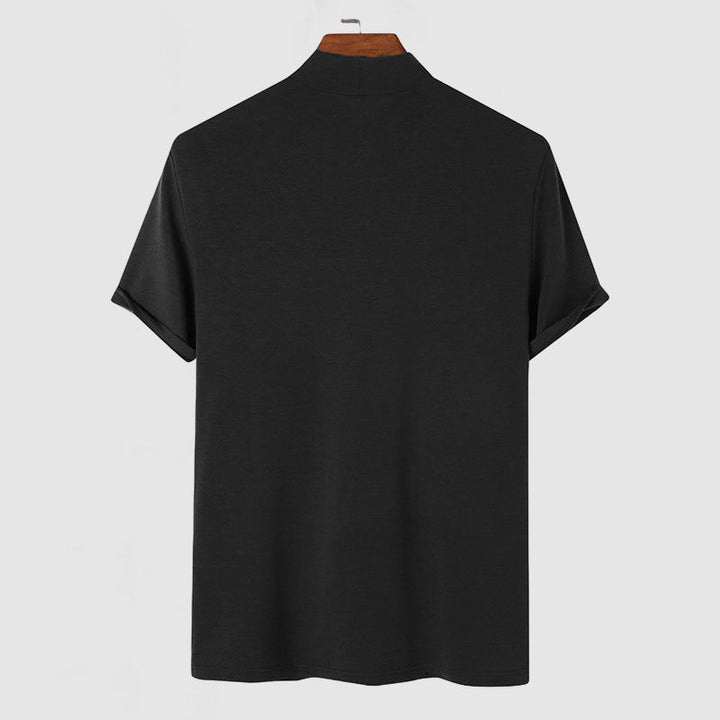 Man wearing a men's basic tee with a modern mock neck, showcasing its versatile style for any occasion.
