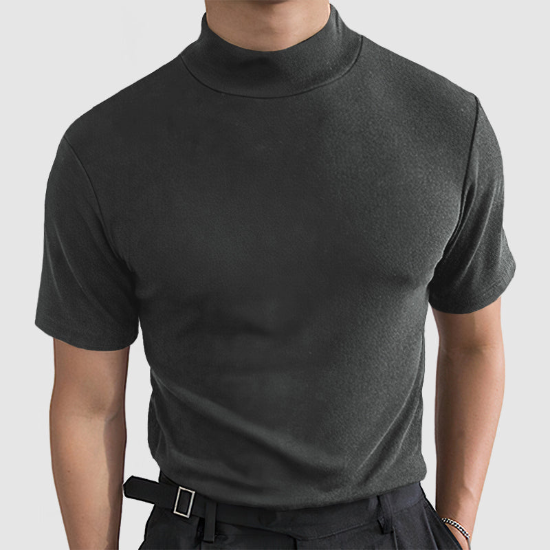 Fashionable men's mock neck stretch t-shirt in a deep navy, an adaptable piece for smart casual outfits.