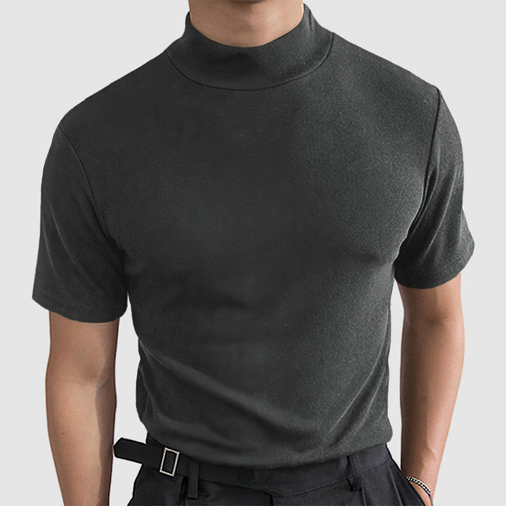 Fashionable men's mock neck stretch t-shirt in a deep navy, an adaptable piece for smart casual outfits.