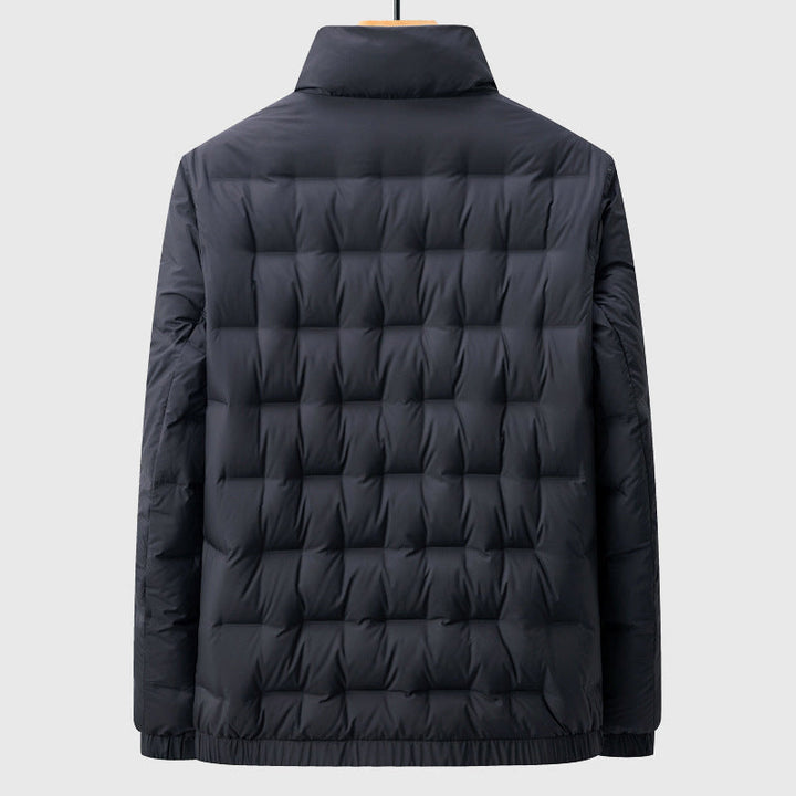 Stylish men's modern quilted outerwear jacket with stand collar, perfect for contemporary casual looks.