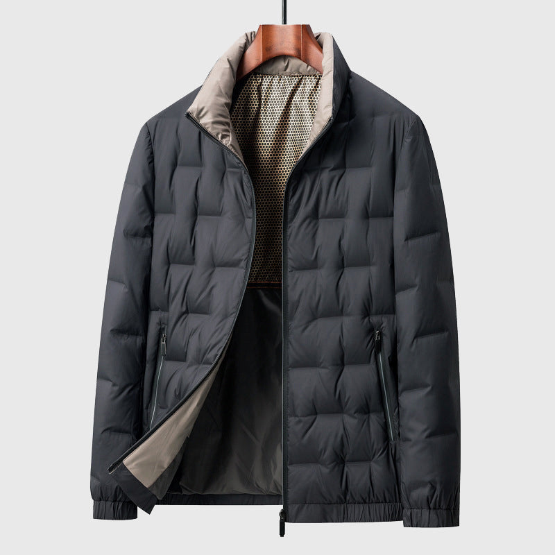 Modern men's lightweight quilted jacket with stand collar & full zip. Versatile casual outerwear.