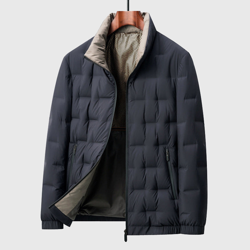 Contemporary men's quilted stand collar jacket. A sleek, windproof outerwear piece for modern style.