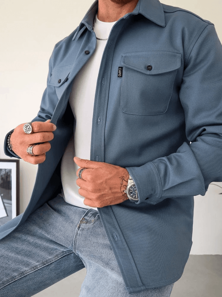 Black men's shirt jacket, modern and versatile, designed for a slim fit and smart casual wear.